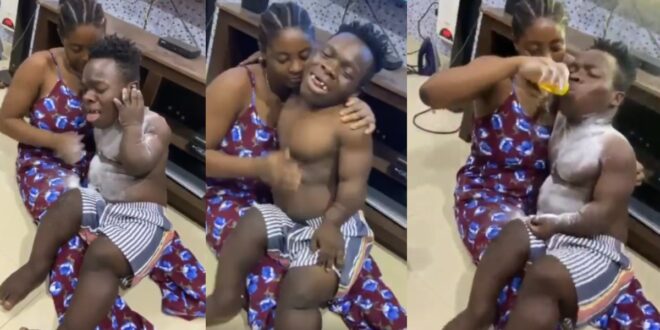 Shatta Bandle causes a stir on social media after he was been breastfed by his girlfriend (video) 1