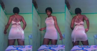 A well-endowed woman dances in her room while shaking her 'backside'. (see video) 23